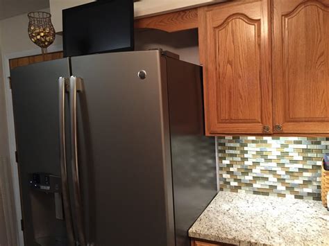 electrical box behind fridge|panel behind a fridge.